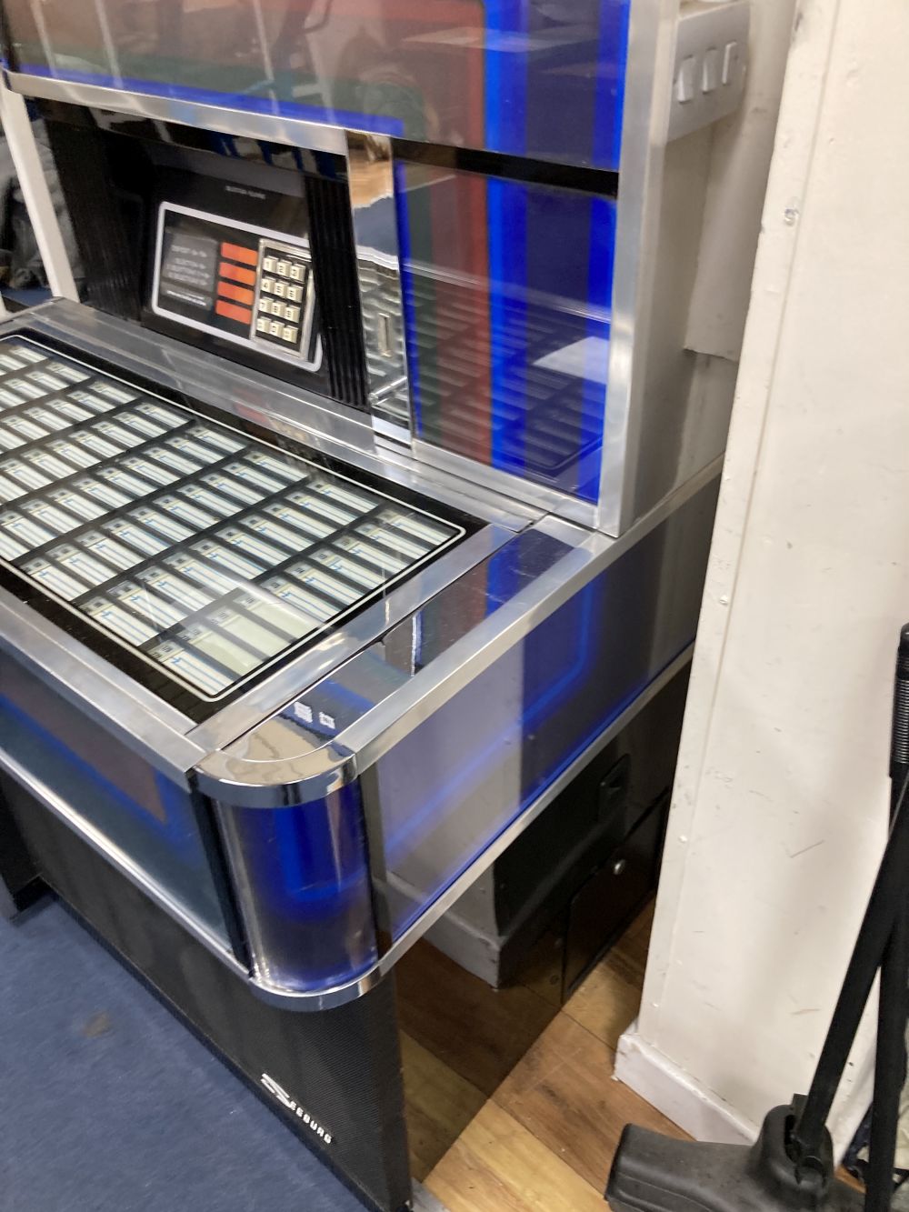 A 1970s Seeburg juke box, width 100cm depth 69cm height 136cm